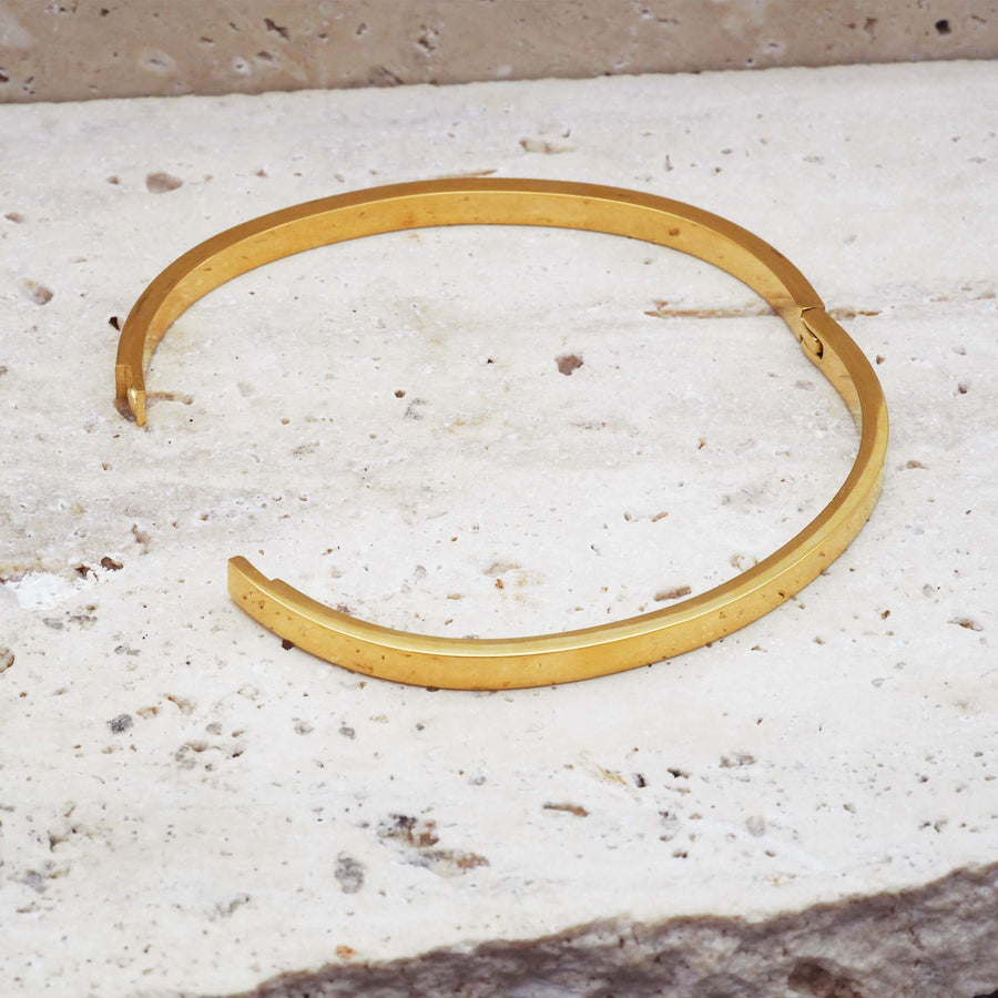 Hinge design bangle made from stainless steel with gold plating - gold jewellery online by indie and harper