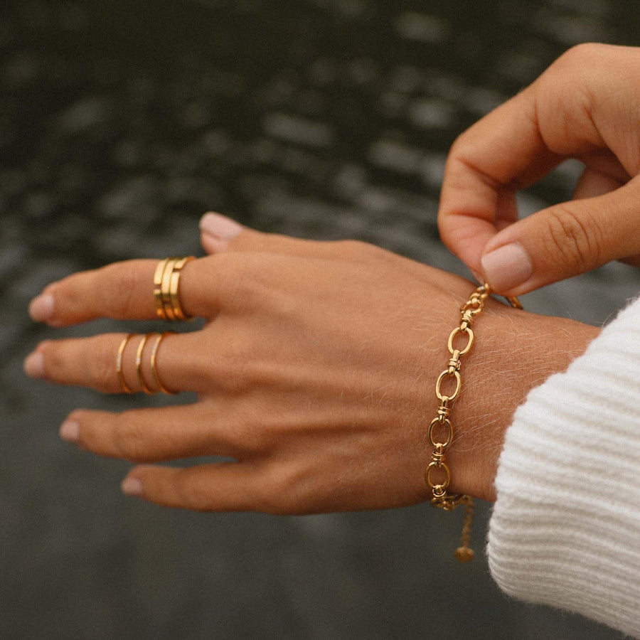 woman wearing gold bracelet and gold rings - womens gold jewellery by Australian jewellery brands indie and harper