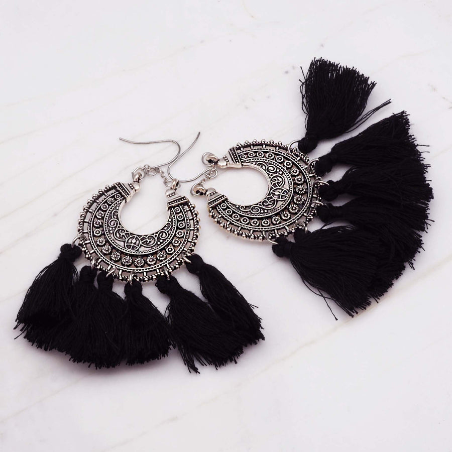 black tassel earrings - women's statement earrings made with metal alloy and cotton tassels - bohemian jewellery online by indie and harper