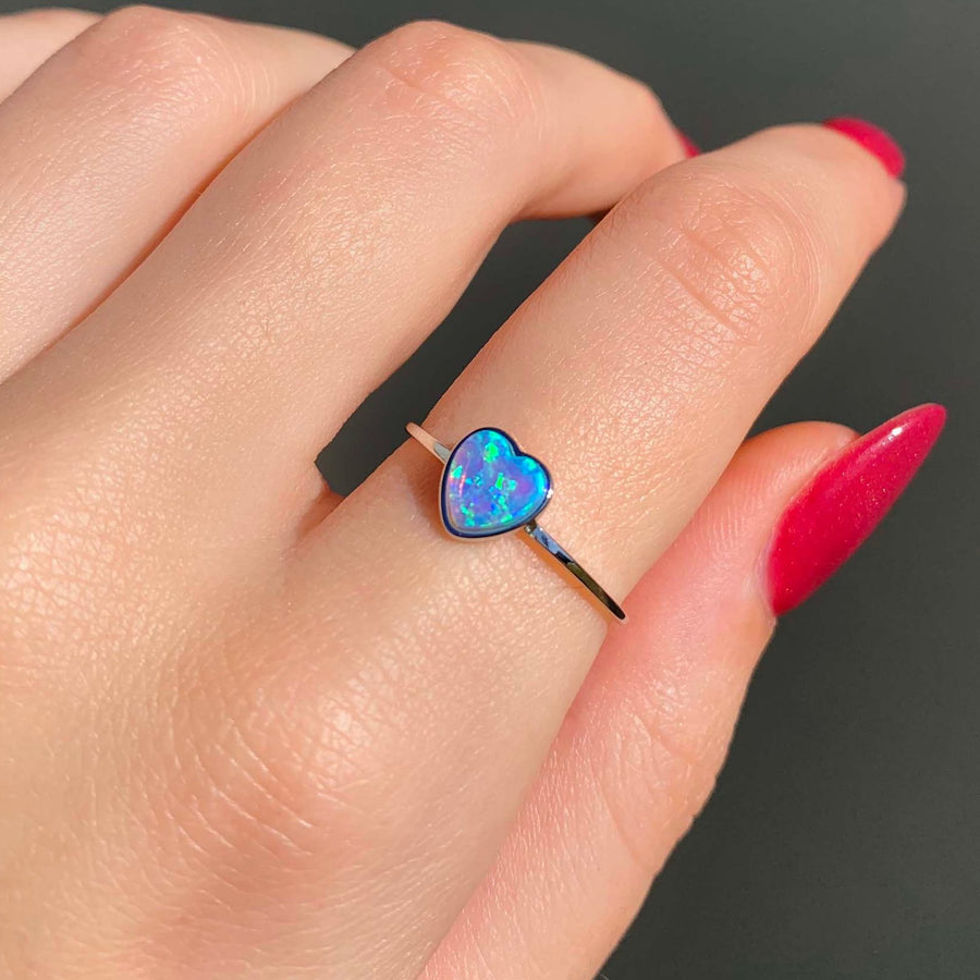 dainty blue heart opal Ring being worn - opal jewellery by australian jewellery brands online indie and Harper