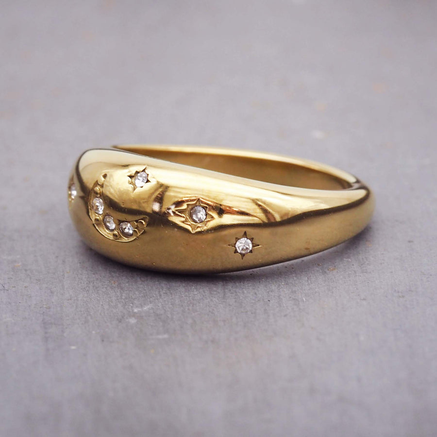 celestial ring made with cubic zirconia, stainless steel and gold plating - moon and star jewellery by indie and harper