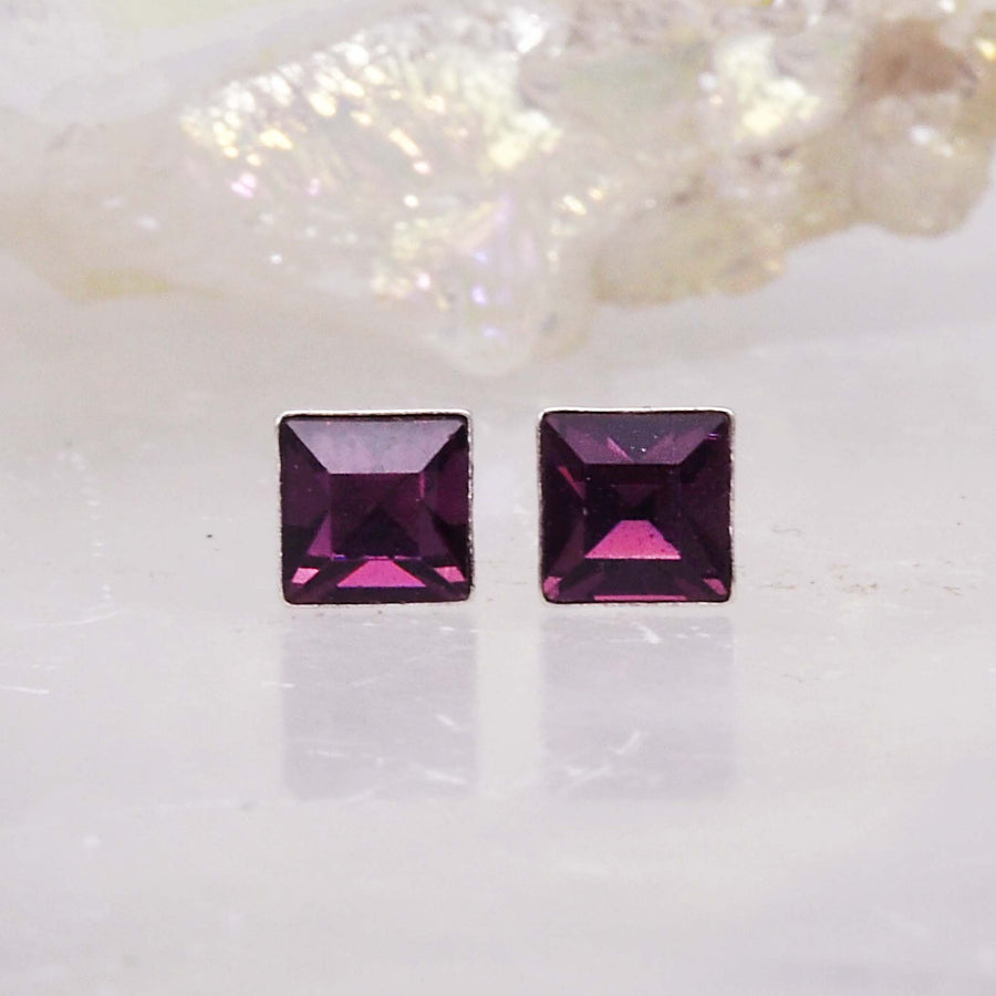 crystal birthstone earrings - made with amethyst coloured crystals and sterling silver - febraury birthstone earrings by indie and harper