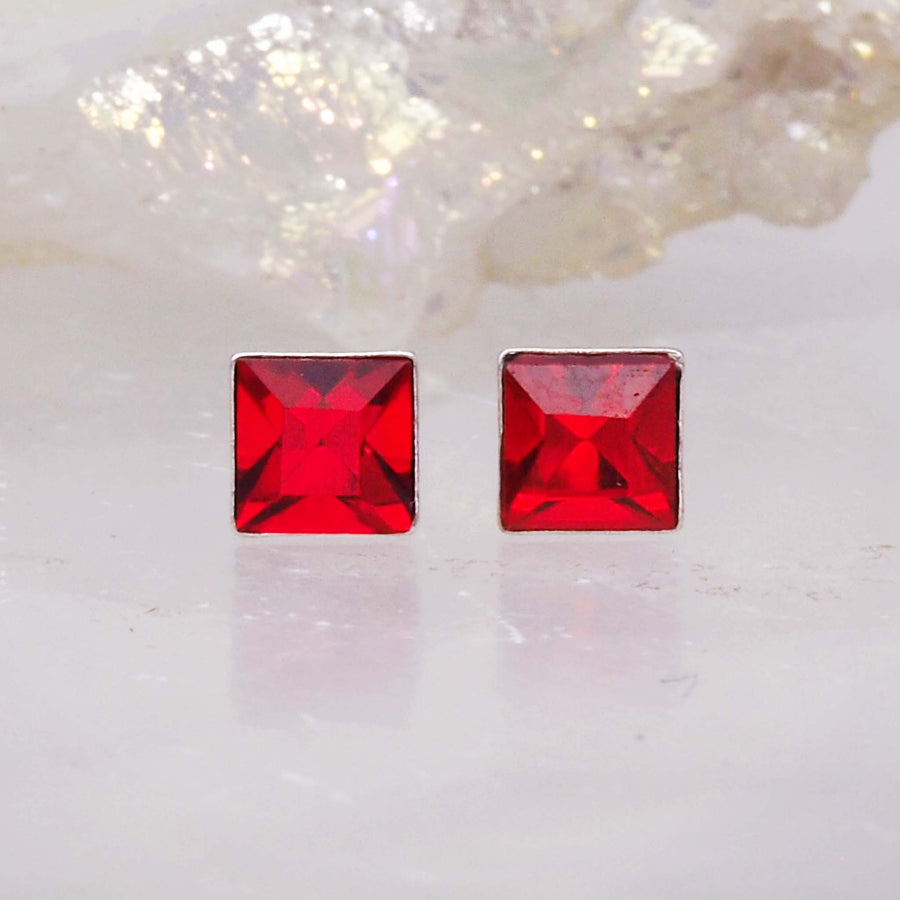 crystal birthstone earrings - sterling silver earrings with red ruby coloured crystals - shop july birthstone jewellery by online jewellery brand indie and harper