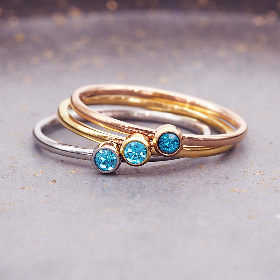 dainty birthstone ring - dainty december birthstone jewellert made with beautiful blue cubic zirconia, stainless steel, gold and rose gold plating - dainty december birthstone ring by online jewellery brand indie and harper