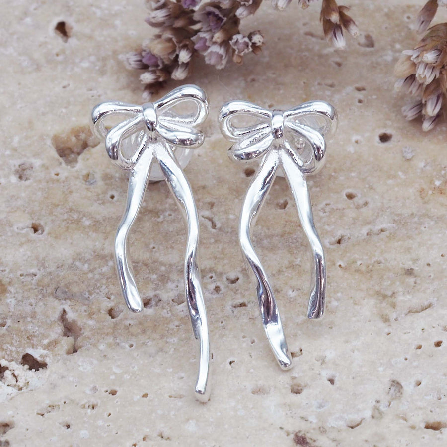 dainty bow earrings - dainty earrings for women with a beautiful bow design made from sterling silver - women's dainty jewellery by indie and harper