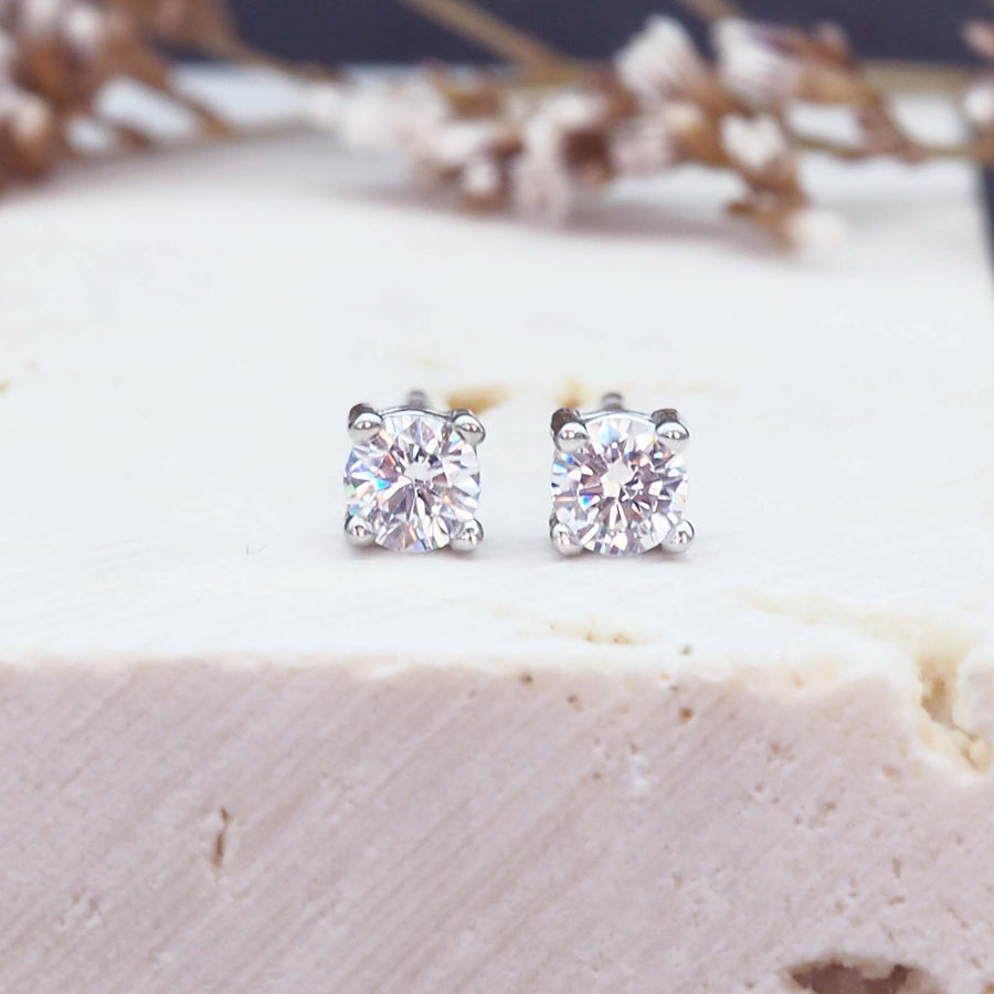 dainty gemstone earrings - sterling silver earrings with a claw set white gemstone - women's earrings online by indie and harper