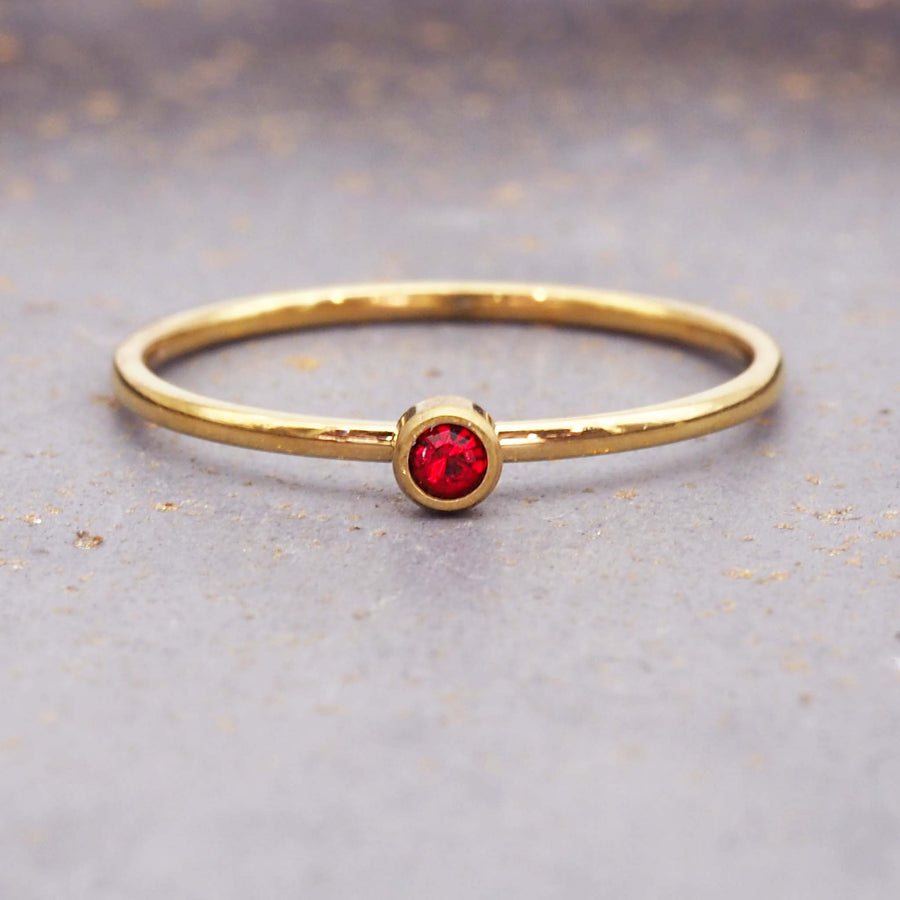 dainty january birthstone ring with red cubic zirconia - gold waterproof jewellery - birthstone jewellery Australia - Australian jewellery brand