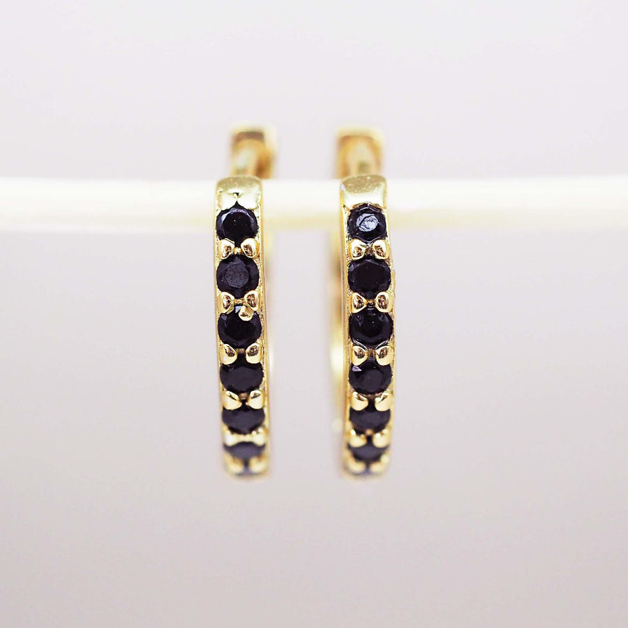 dainty gold huggie earrings with black cubic zirconias - womens gold jewellery by Australian jewellery brands online indie and Harper 