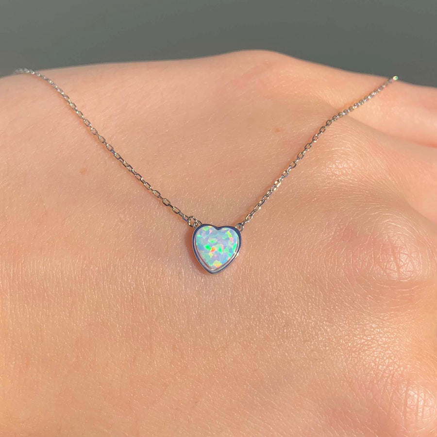 dainty opal heart necklace - sterling silver necklace with white opal heart - shinning bright in the natural sunlight - dainty jewellery by indie and harper