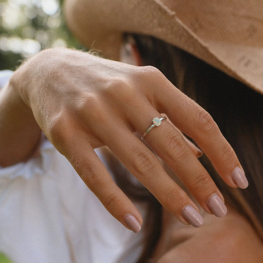 Dainty opal ring being worn - opal jewellery by Australian jewellery brands online indie and Harper 