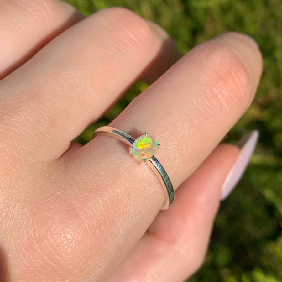 Dainty opal ring being worn - opal jewellery by Australian jewellery brands indie and Harper 