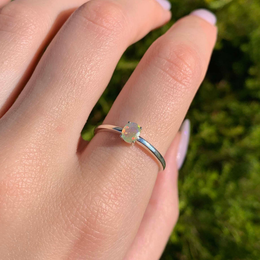 Dainty opal ring being worn - opal jewellery by Australian jewellery brands indie and Harper 