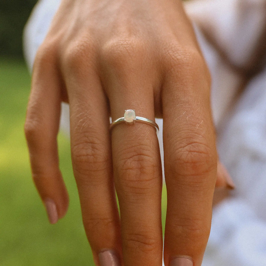 Dainty opal ring being worn - opal jewellery by Australian jewellery brands indie and Harper 