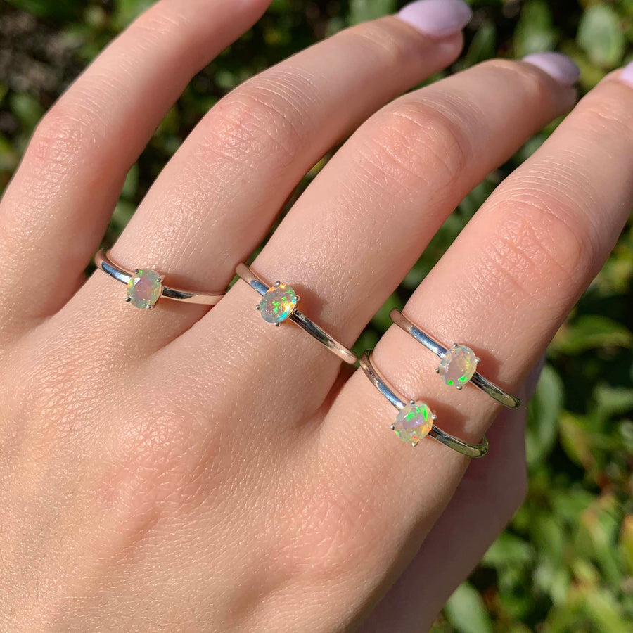 Dainty opal rings being worn - opal jewellery by Australian jewellery brands online indie and Harper 