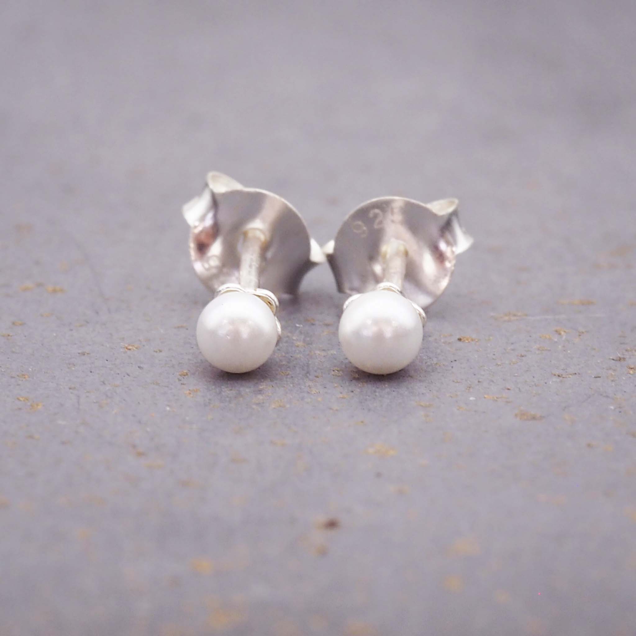 dainty earrings made with sterling silver and glass pearls - women's dainty jewellery online by indie and harper