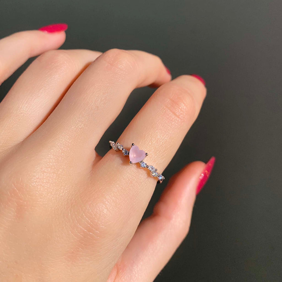 Sterling silver dainty pink heart opal ring being worn - pink opal jewellery by Australian jewellery brands indie and Harper