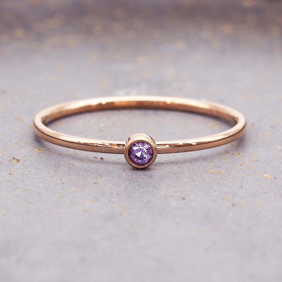 dainty rose gold birthstone ring - stainless steel birthstone jewellery with purple cubic zirconia gemstones, gold and rose gold plating - dainty rose gold february birthstone ring by indie and harper