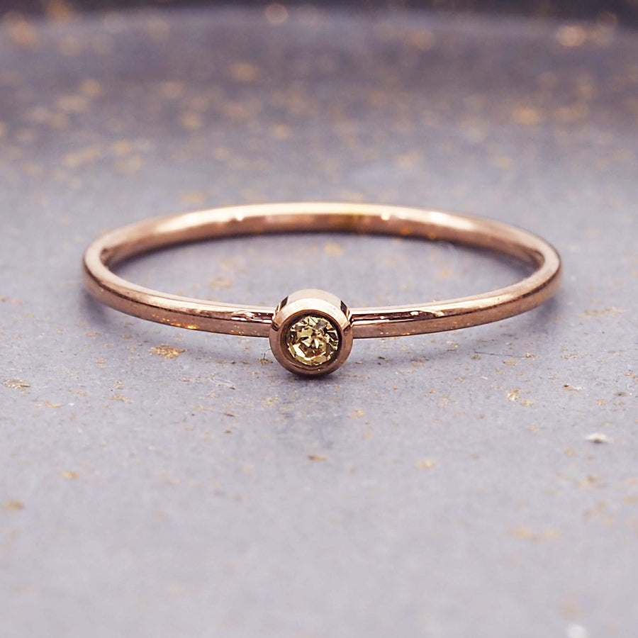 dainty rose gold birthstone ring - stainless steel and rose gold november birthstone jewellery made with yellow cubic zirconia gemstones - dainty rose gold november birthstone ring by online jewellery brand indie and harper