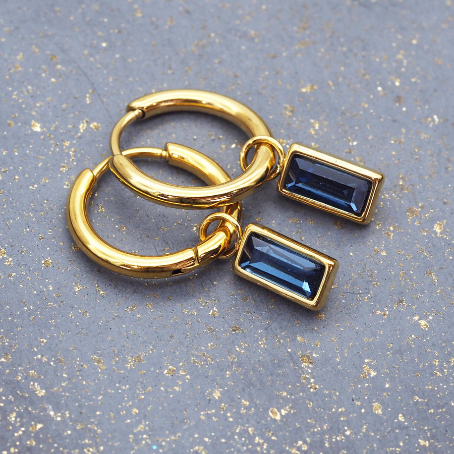 dainty sapphire blue and gold earrings - gold jewellery by womens jewellery brand indie and harper