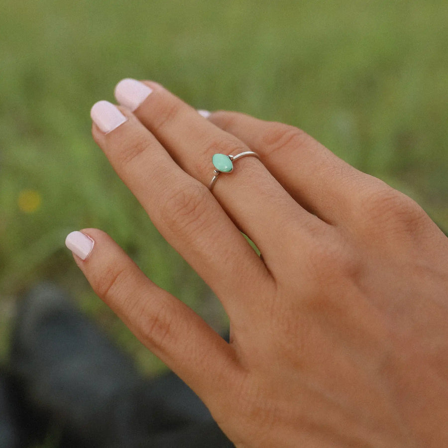 Woman wearing sterling silver dainty turquoise ring - turquoise jewellery by australian jewellery brands indie and Harper