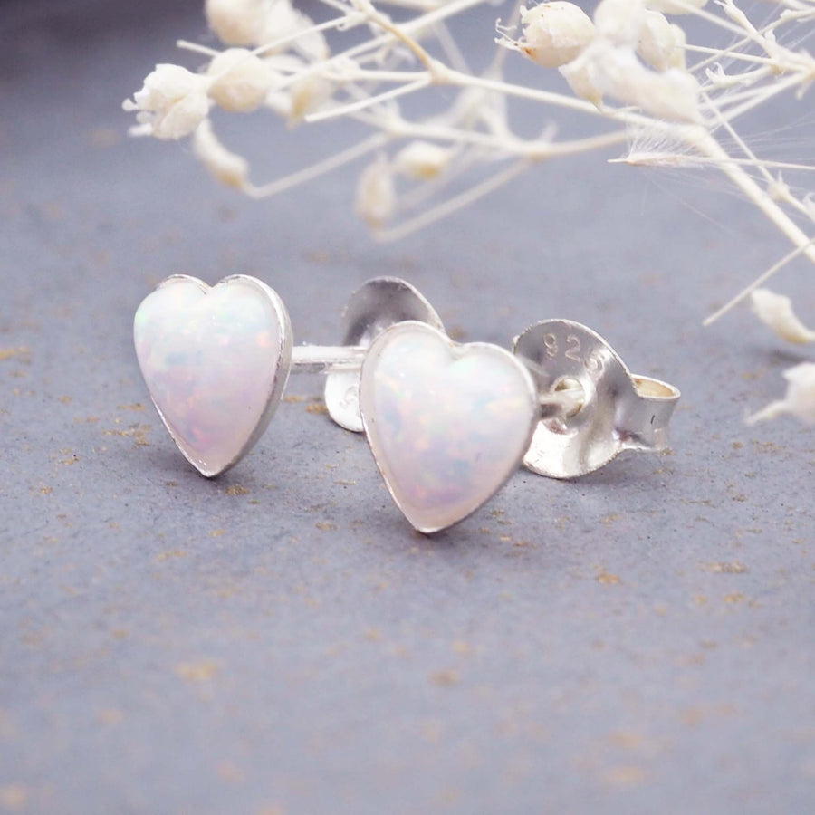 sterling silver earrings with synthetic white opal hearts - women's dainty jewellery online by indie and harper