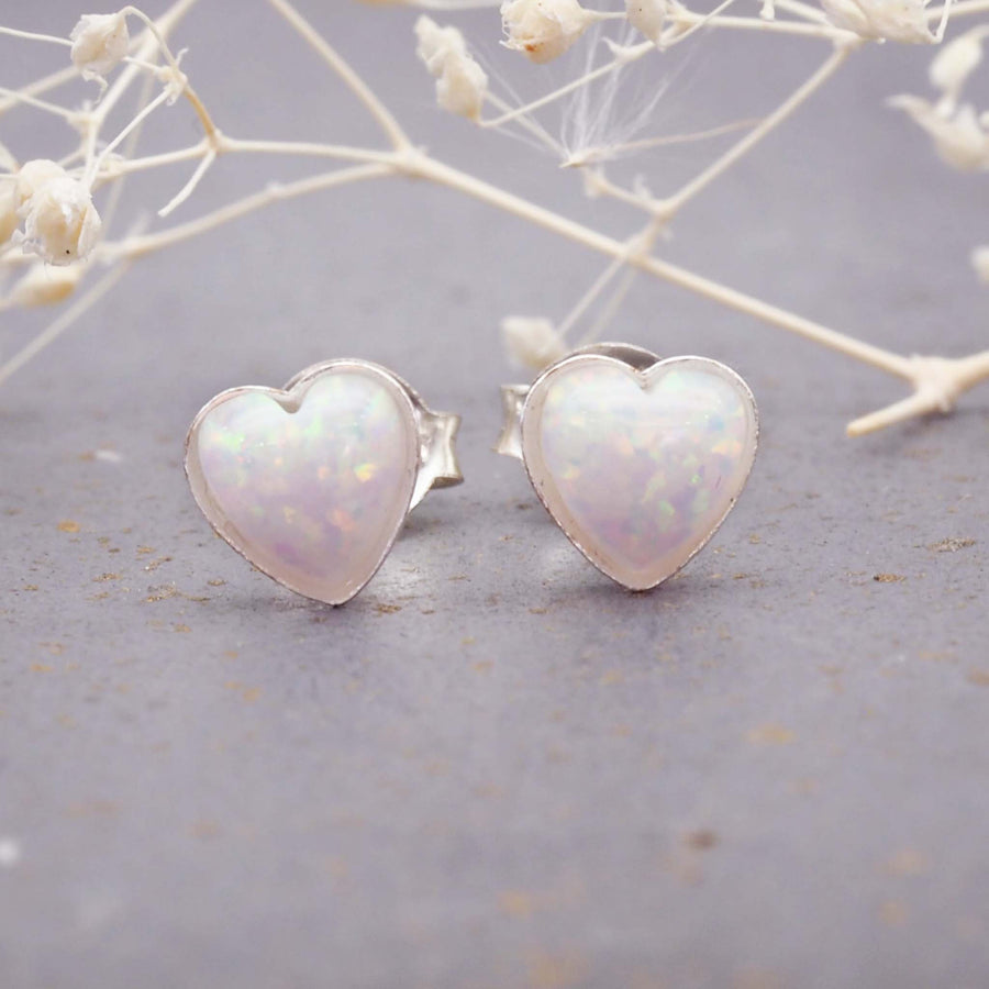 white opal and sterling silver studs with dainty heart design - women's jewellery online by indie and harper