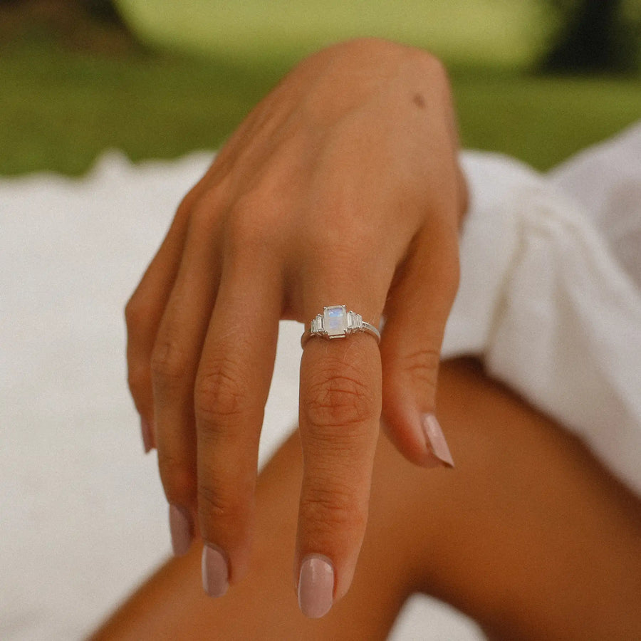 woman wearing sterling silver topaz stone and moonstone ring - moonstone jewelry by australian jewellery brands indie and harper