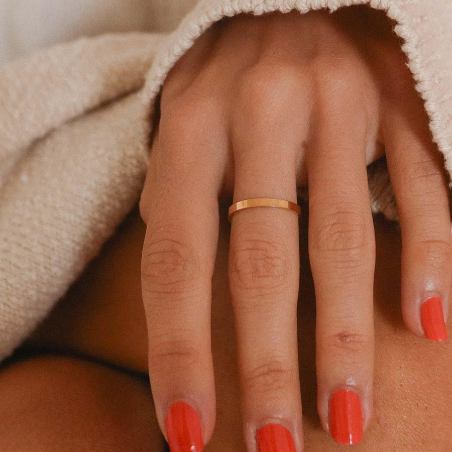 Woman with red nails wearing rose gold Ring - womens rose gold jewellery Australia by australian jewellery brands indie and harper