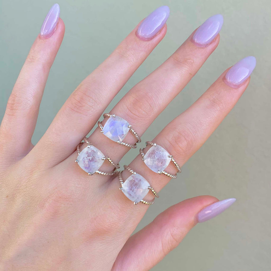 Women’s hand with purple nail polish wearing Sterling silver moonstone rings - women’s moonstone jewellery by Australian jewellery brands online indie and harper