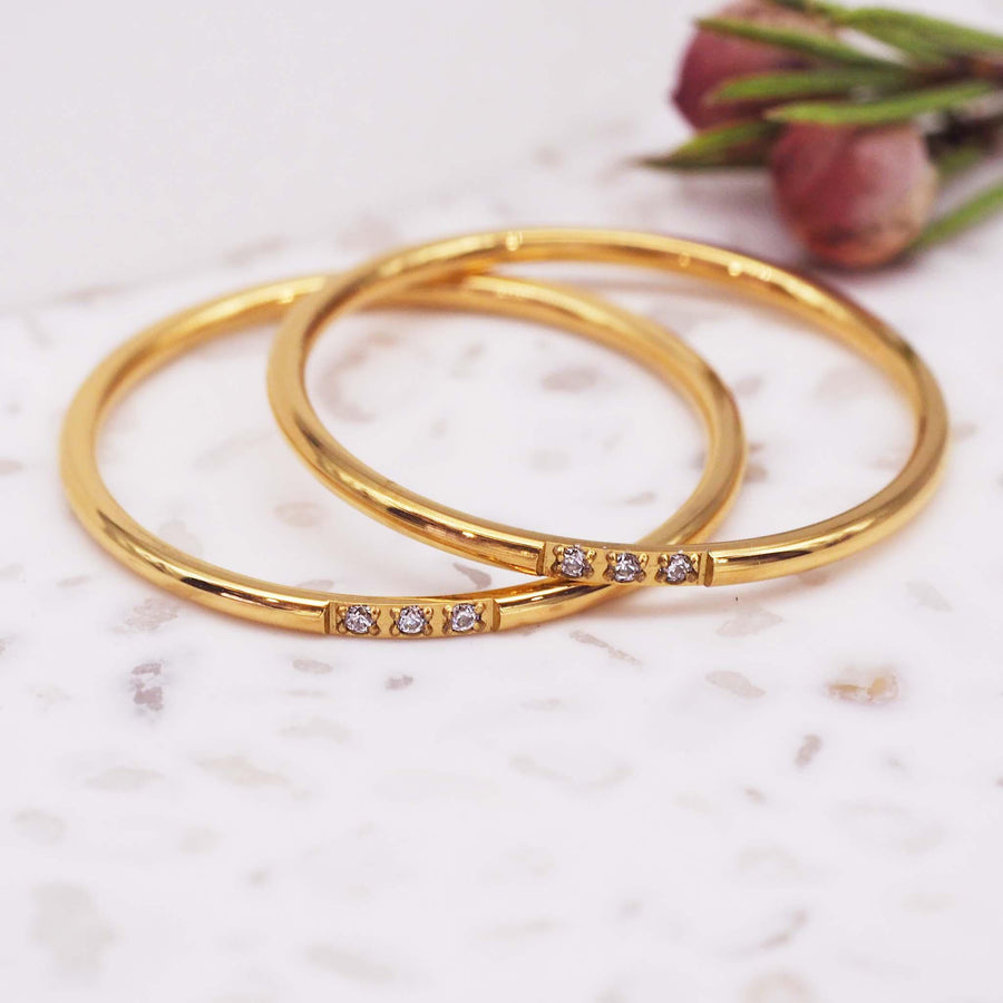 gold rings with 3 cubic zirconias - womens gold jewellery by Australian waterproof jewellery brands indie and Harper