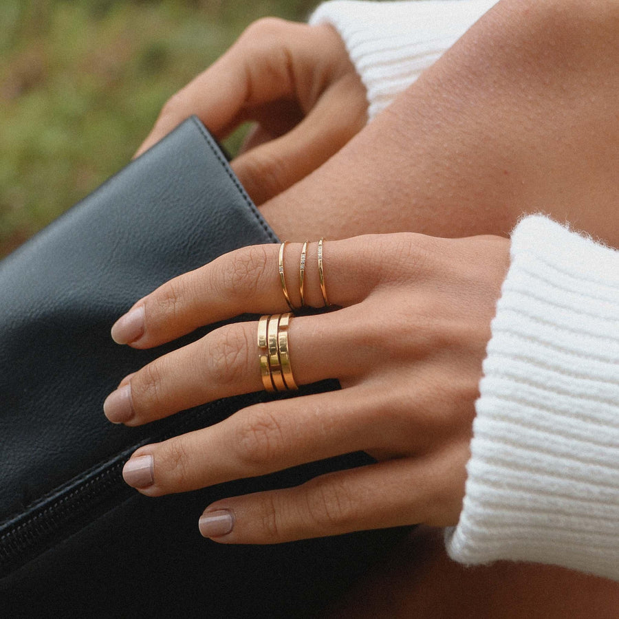 Woman wearing gold rings - womens gold jewellery by Australian waterproof jewellery brands indie and Harper