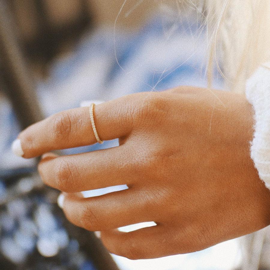 Woman wearing Eternity gold ring - gold promise rings and gold jewellery by Australian jewellery brands online indie and harper 