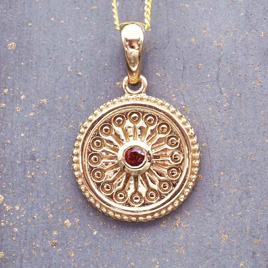 gold dainty flower garnet necklace - gold plating over sterling silver and natural garnet gemstone - dainty necklace by online jewellery brand indie and harper