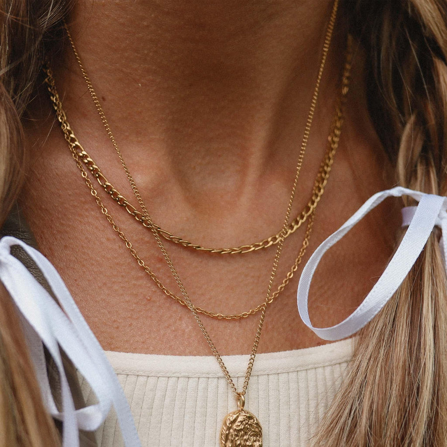 Woman wearing Gold layered Necklaces - gold jewellery by Australian jewellery brands indie and Harper