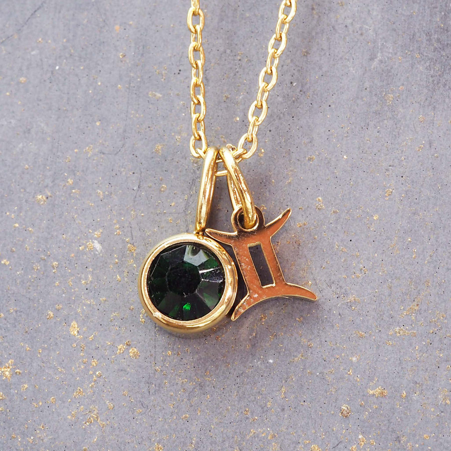 gold may gemini necklace - zodiac jewellery for women made with stainless steel, gold and green cubic zirconia - waterproof jewellery online by indie and harper