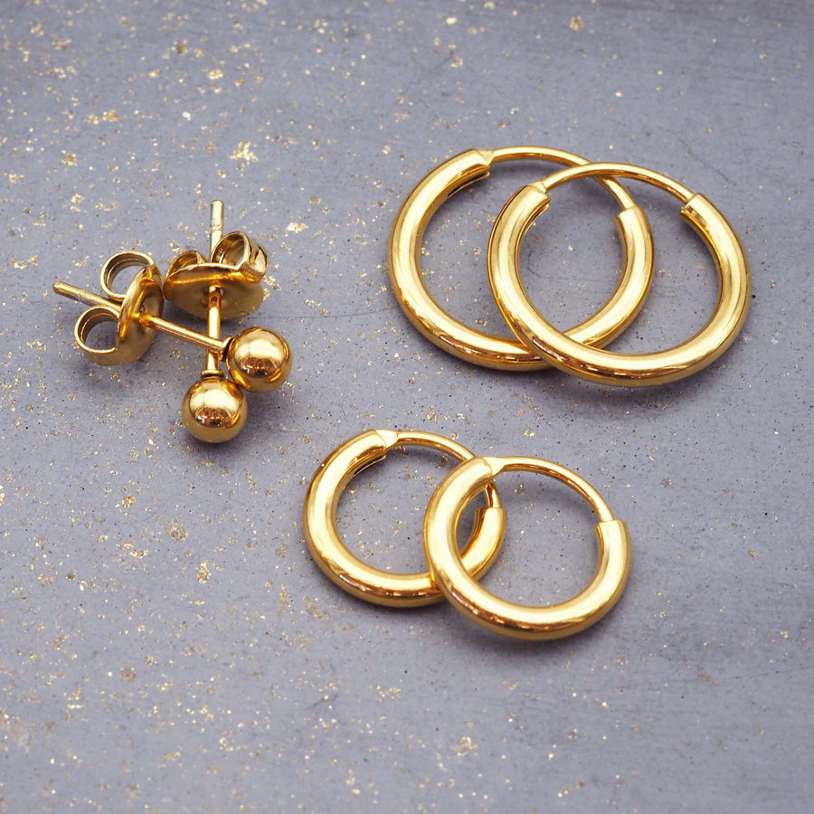 gold earrings set made with stainless steel - three earrings designs perfect for stacking together - women's jewellery by indie and harper