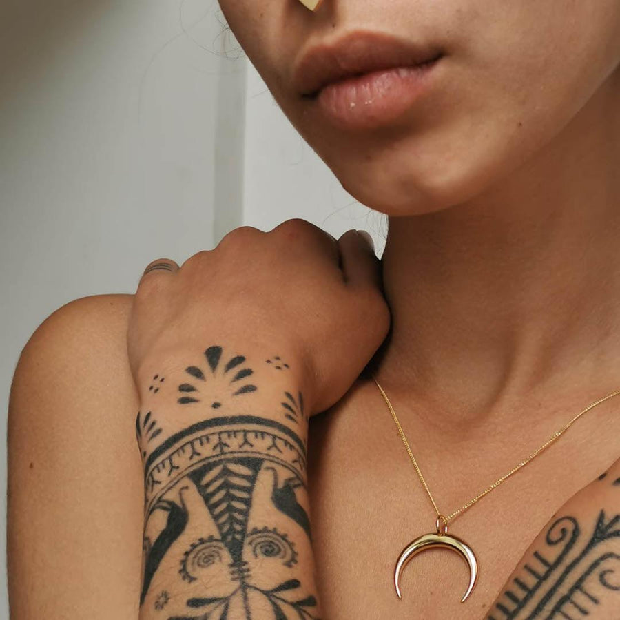 woman with black tattoos wearing gold necklace - womens gold jewellery australia - australian jewellery brands indie and harper