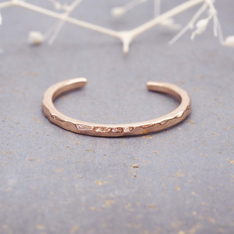 dainty toe ring with hammered detailing made with rose gold ecoating over sterling silver - Women's online jewelry by indie and harper