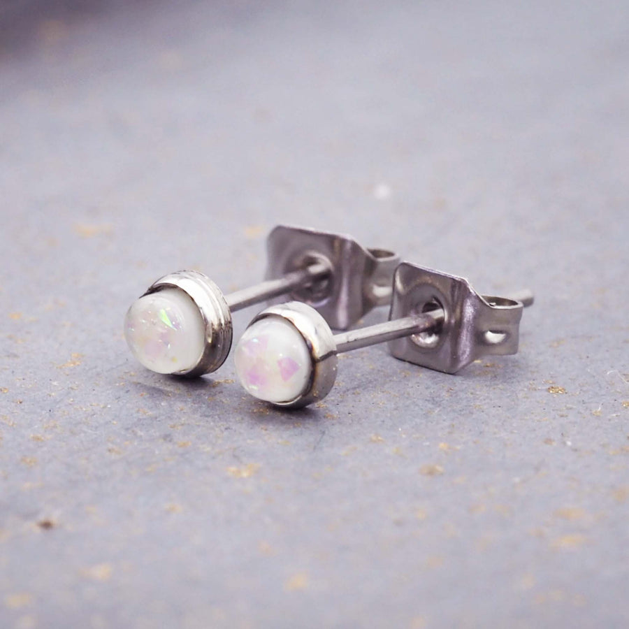 white opal earrings made with stainless steel - waterproof jewellery by online jewellery brand indie and harper