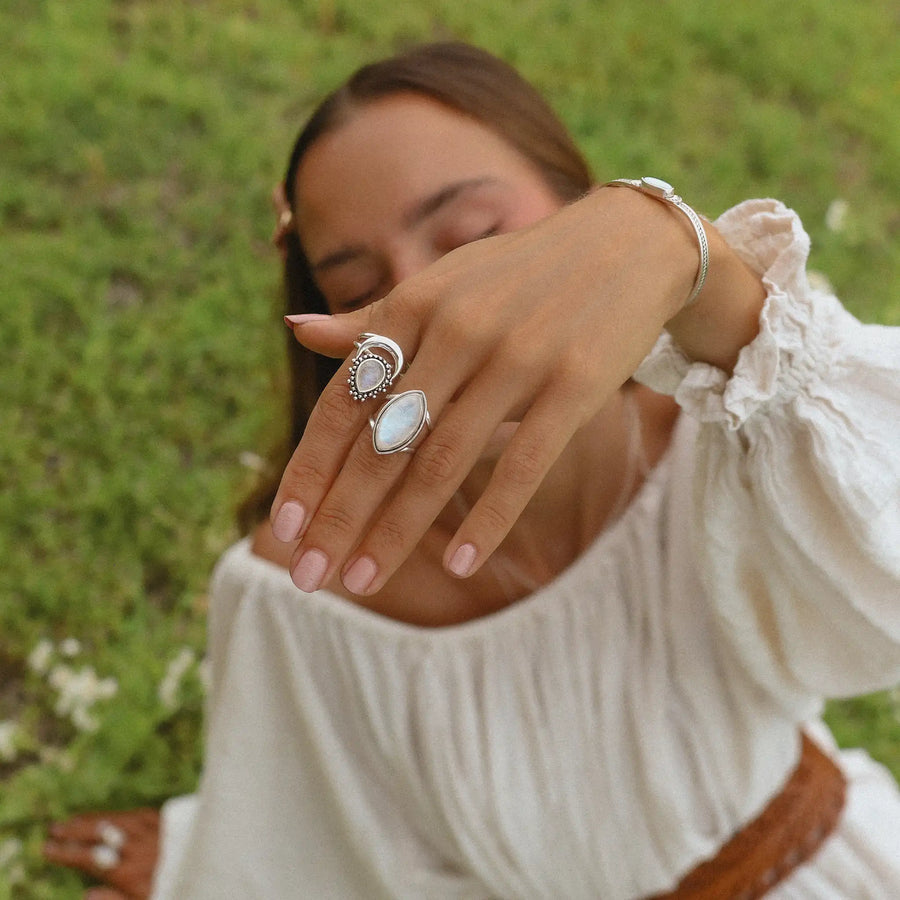 woman wearing two moonstone rings - moonstone jewellery by womens jewellery brand indie and harper