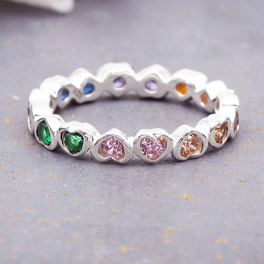 Sterling silver ring with rainbow coloured hearts - womens jewellery by Australian jewellery brands indie and harper