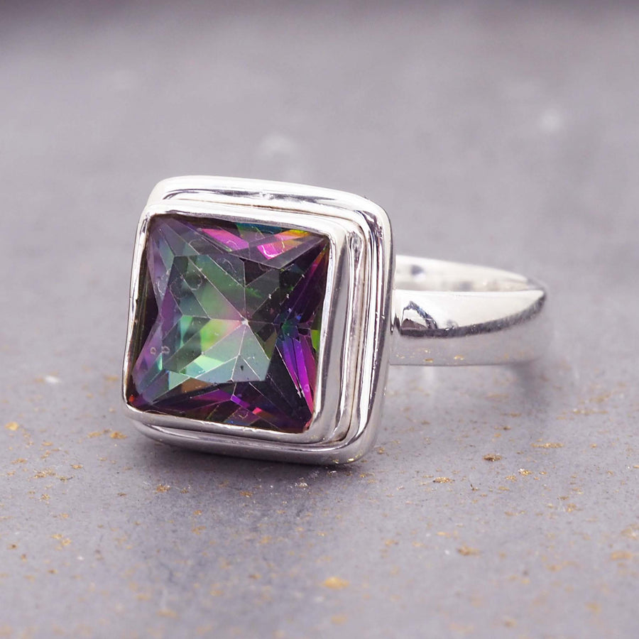 mystic quartz ring - this sterling silver ring is made with a natural mystic quartz that reflects the sunlight and displays a beautiful array of colours - boho women's jewellery online by indie and harper