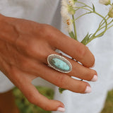 woman's hand wearing a large sterling silver turquoise ring - turquoise jewellery and Native American jewelry by australian jewellery brands online indie and harper