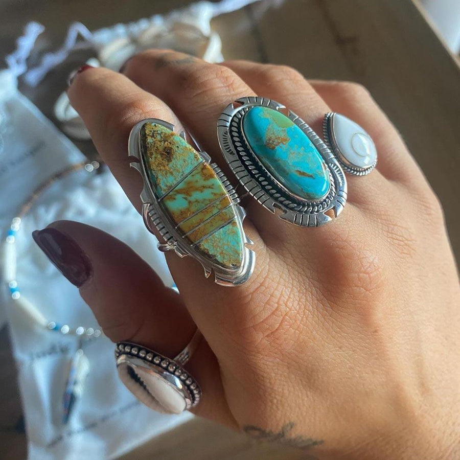 Hand wearing Sterling Silver turquoise rings - boho jewellery by Australian jewellery brands online indie and harper