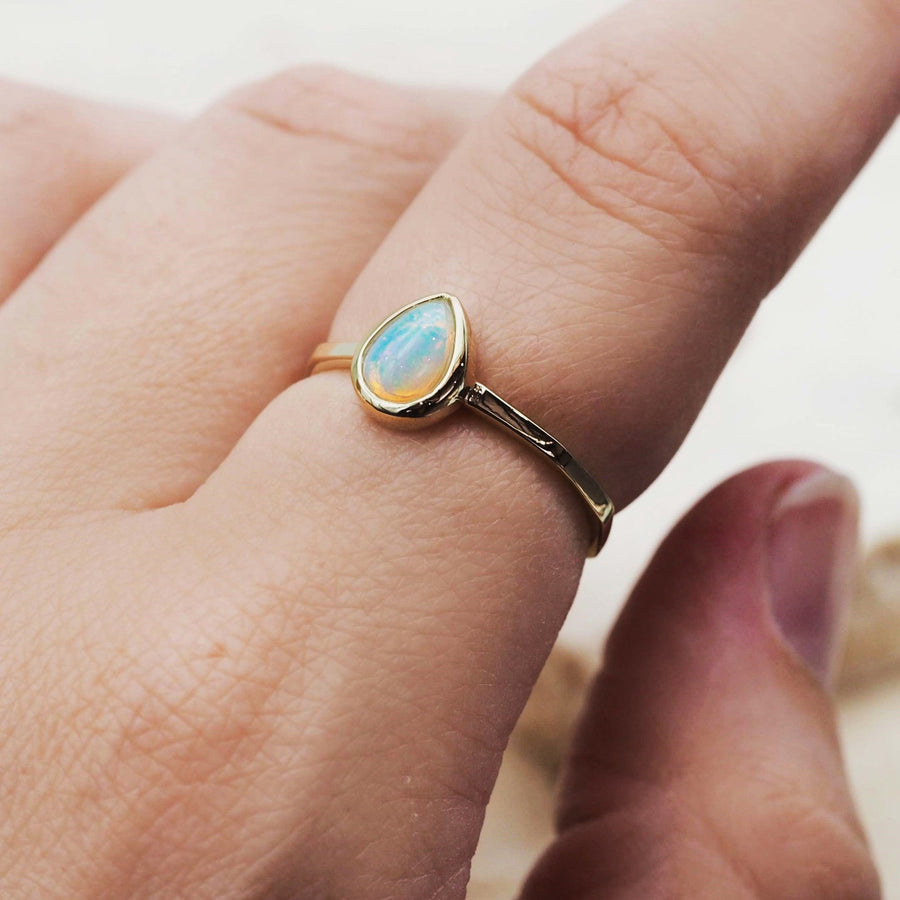 october birthstone gold opal ring being worn - october birthstone opal jewellery by australian jewellery brands indie and harper