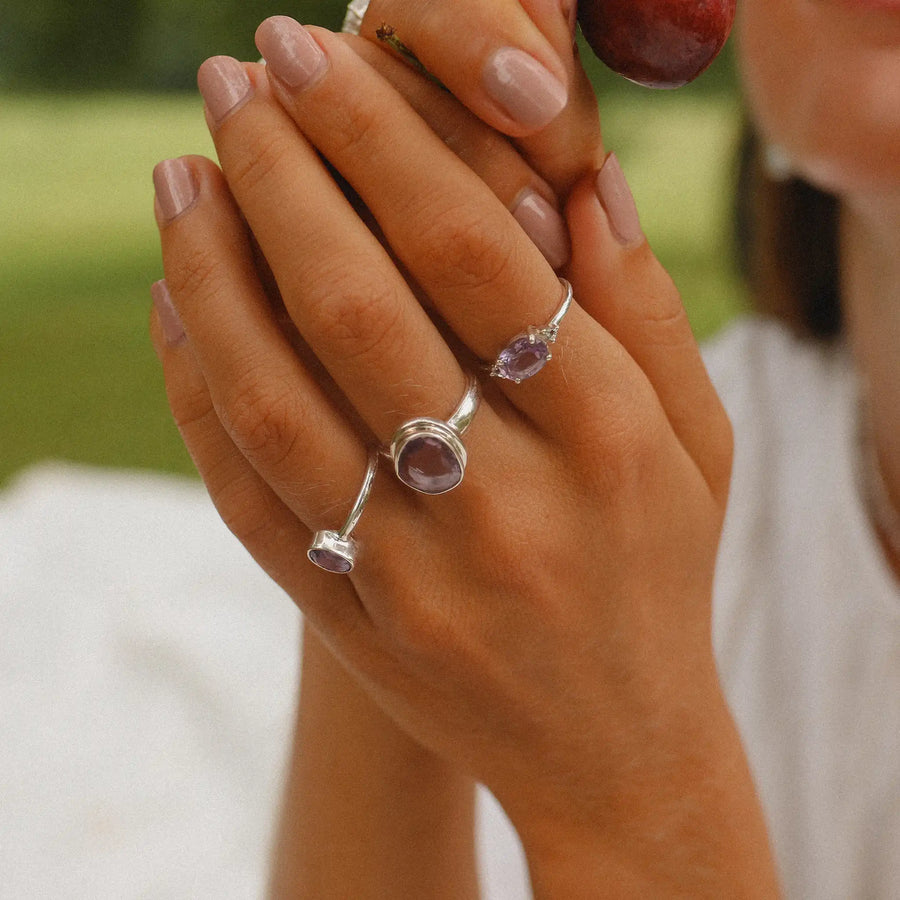 Woman wearing amethyst rings - amethyst jewellery by australian jewellery brands indie and Harper