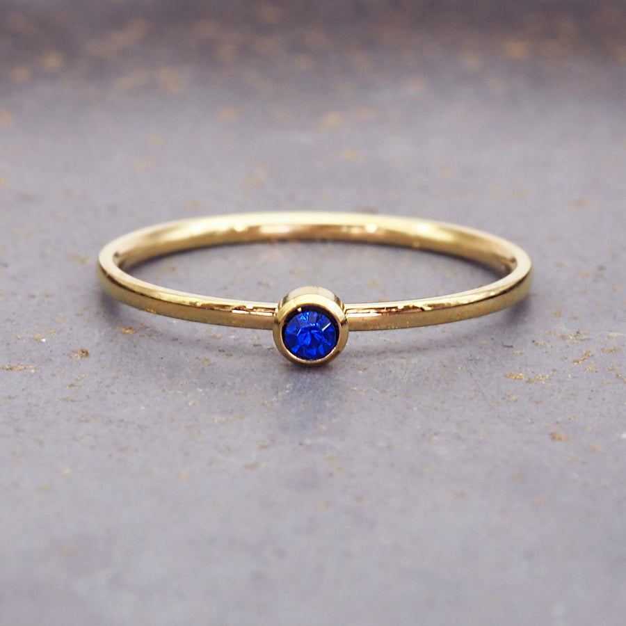 September birthstone dainty gold ring - gold waterproof jewellery by australian jewellery brands indie and harper 