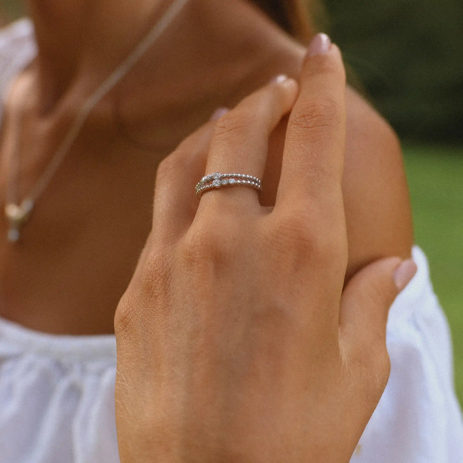 Woman wearing Dainty Sterling silver ring - Sterling silver promise rings and Sterling silver jewellery by Australian jewellery brands online indie and harper 