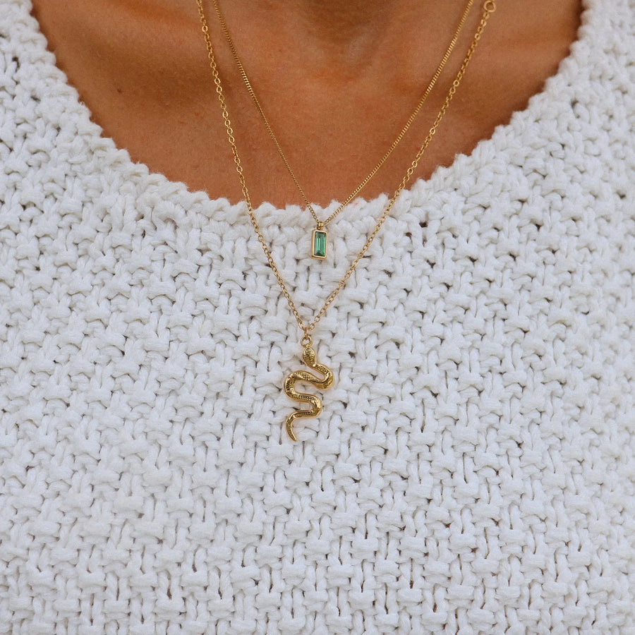 Woman wearing gold necklaces with serpent design - gold waterproof jewellery by Australian jewellery brands indie and Harper