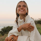 Woman with white jumper and hair in plaits wearing Sterling Silver Bracelets - boho jewellery Australia by Australian jewellery brands online indie and harper